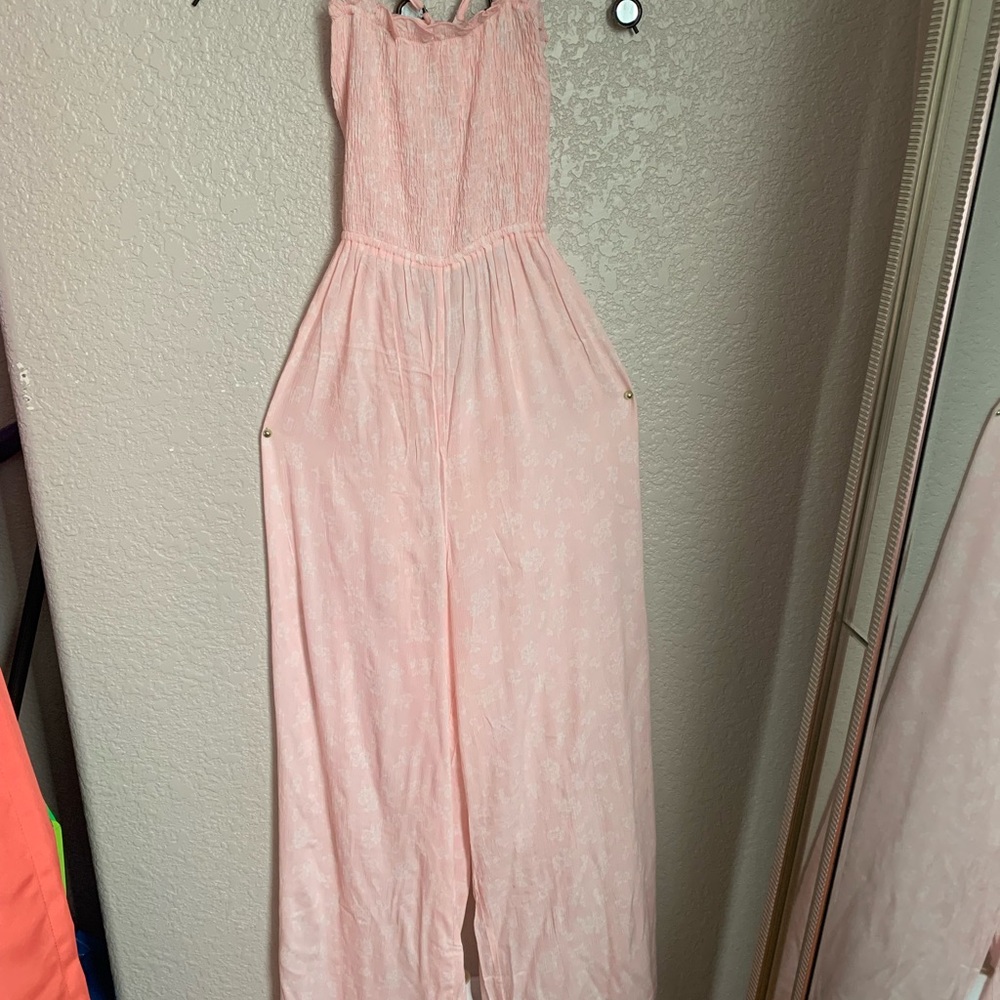 Ice pink jumper with slit side leg. Size L